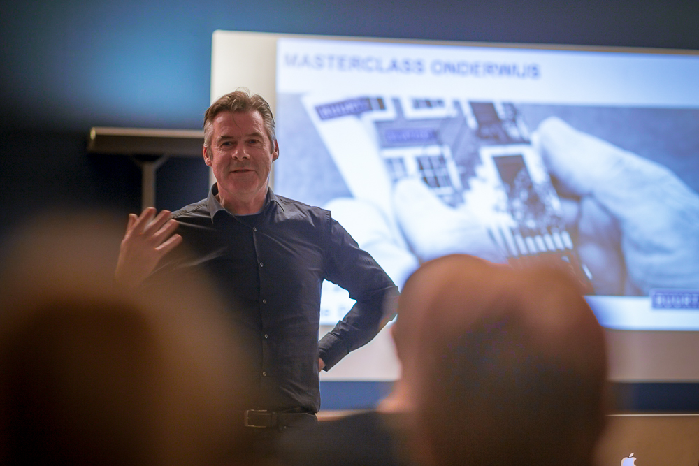 Jos de Blok talking with clients and colleagues