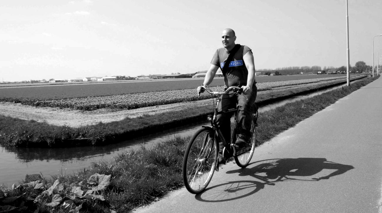 A Buurtzorg nurse on a bike