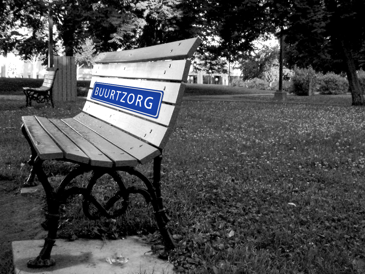 A park bench with the Buurtzorg logo