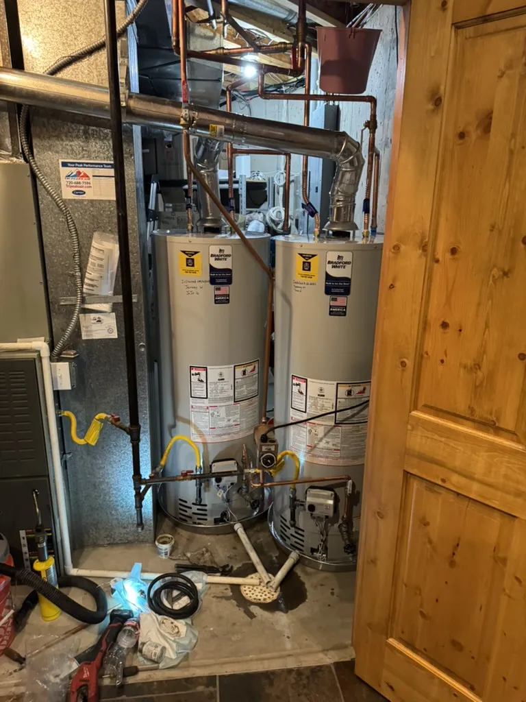 Insulated water heater with energy efficiency tips and maintenance checklist in a bright setting