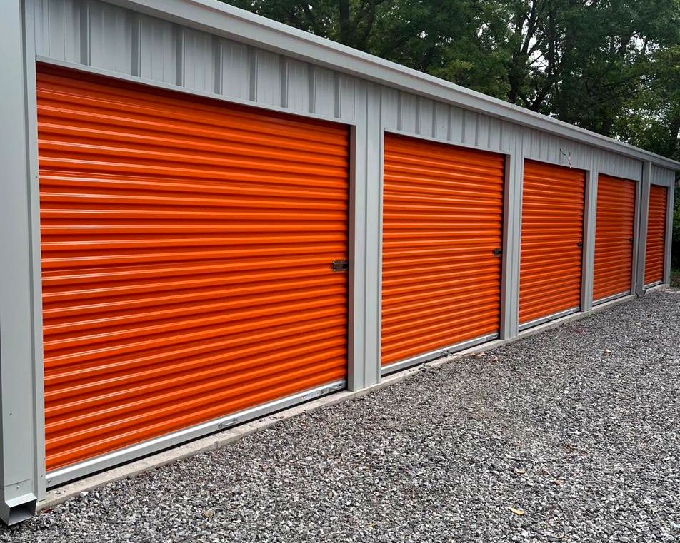 Long row of brand new drive up storage units at the HJ Storage facility
