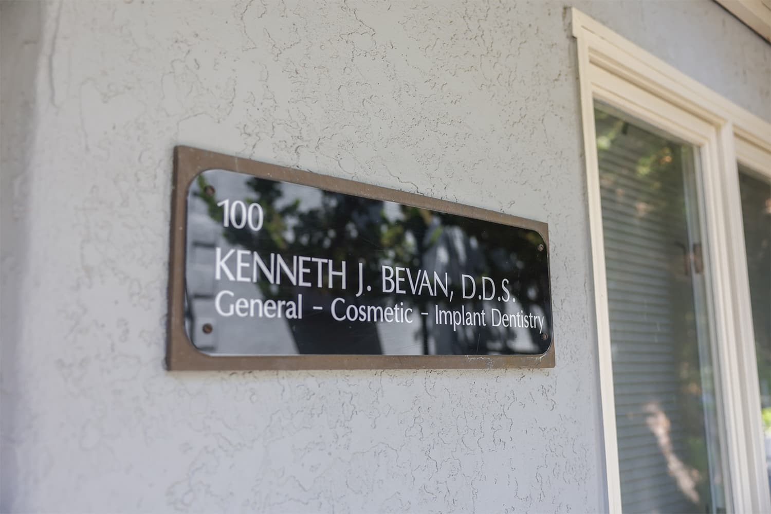 Office sign for Kenneth J. Bevan, DDS, general, cosmetic, and implant dentistry in Napa, CA