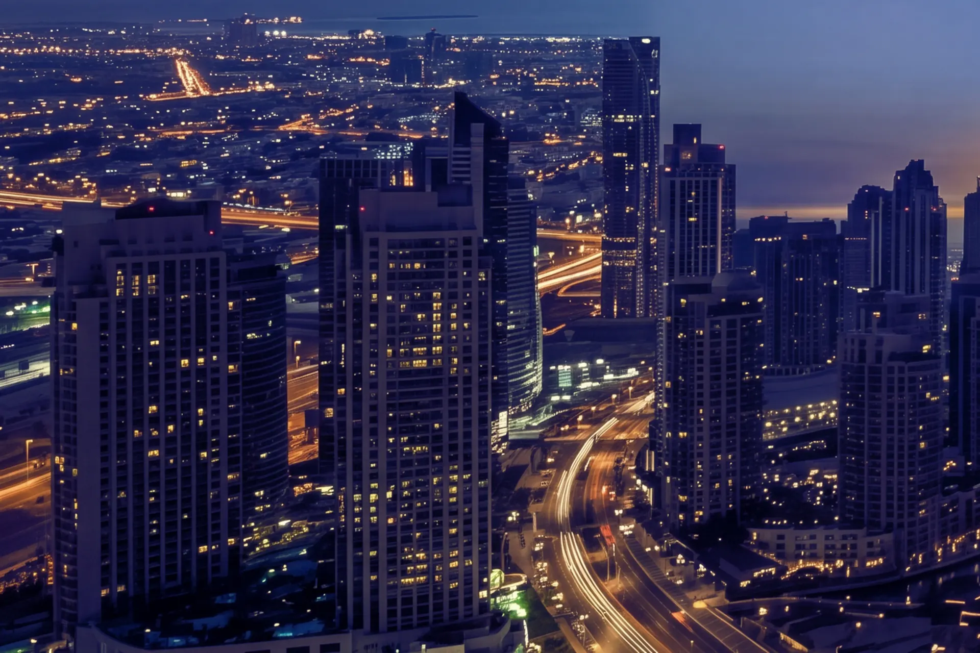 Dubai city lights and road trails at blue hour