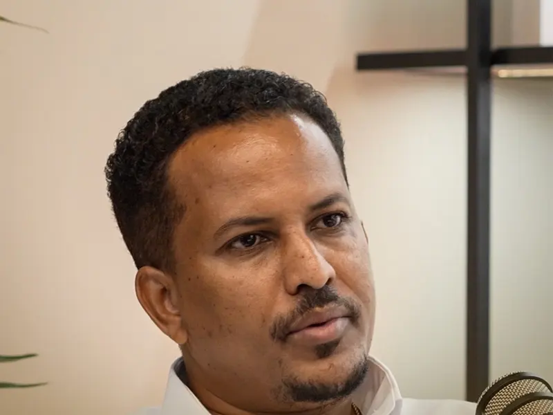 Yonas Tefera in the And Again Advisory podcast studio
