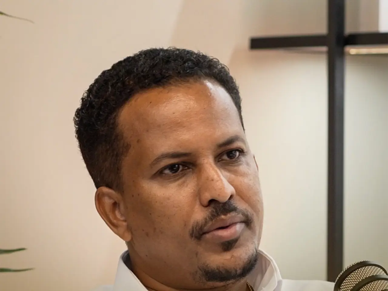 Yonas Tefera in the And Again Advisory podcast studio