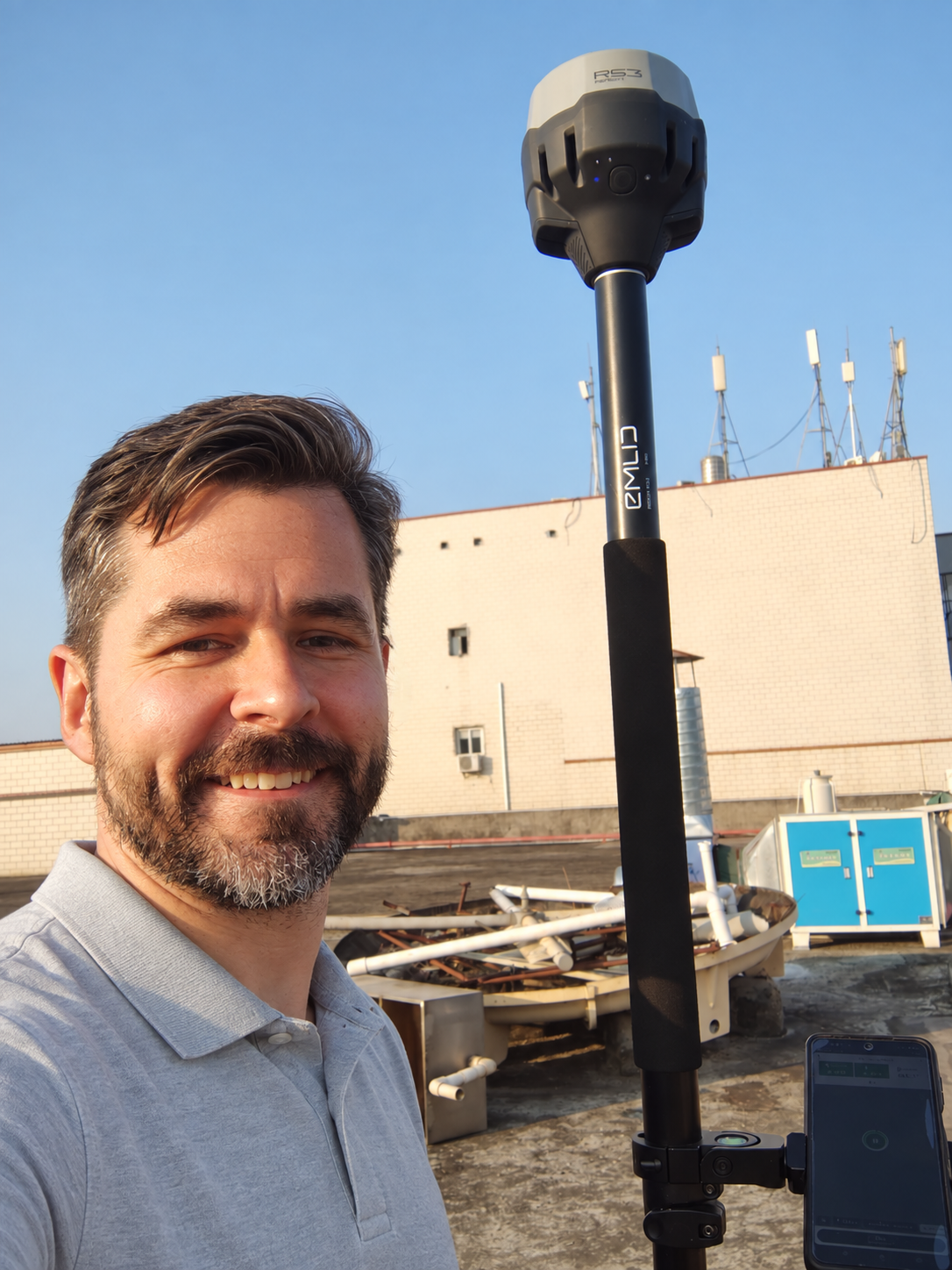 Ron Eicher, principal of EBG Studios, surveying in the field
