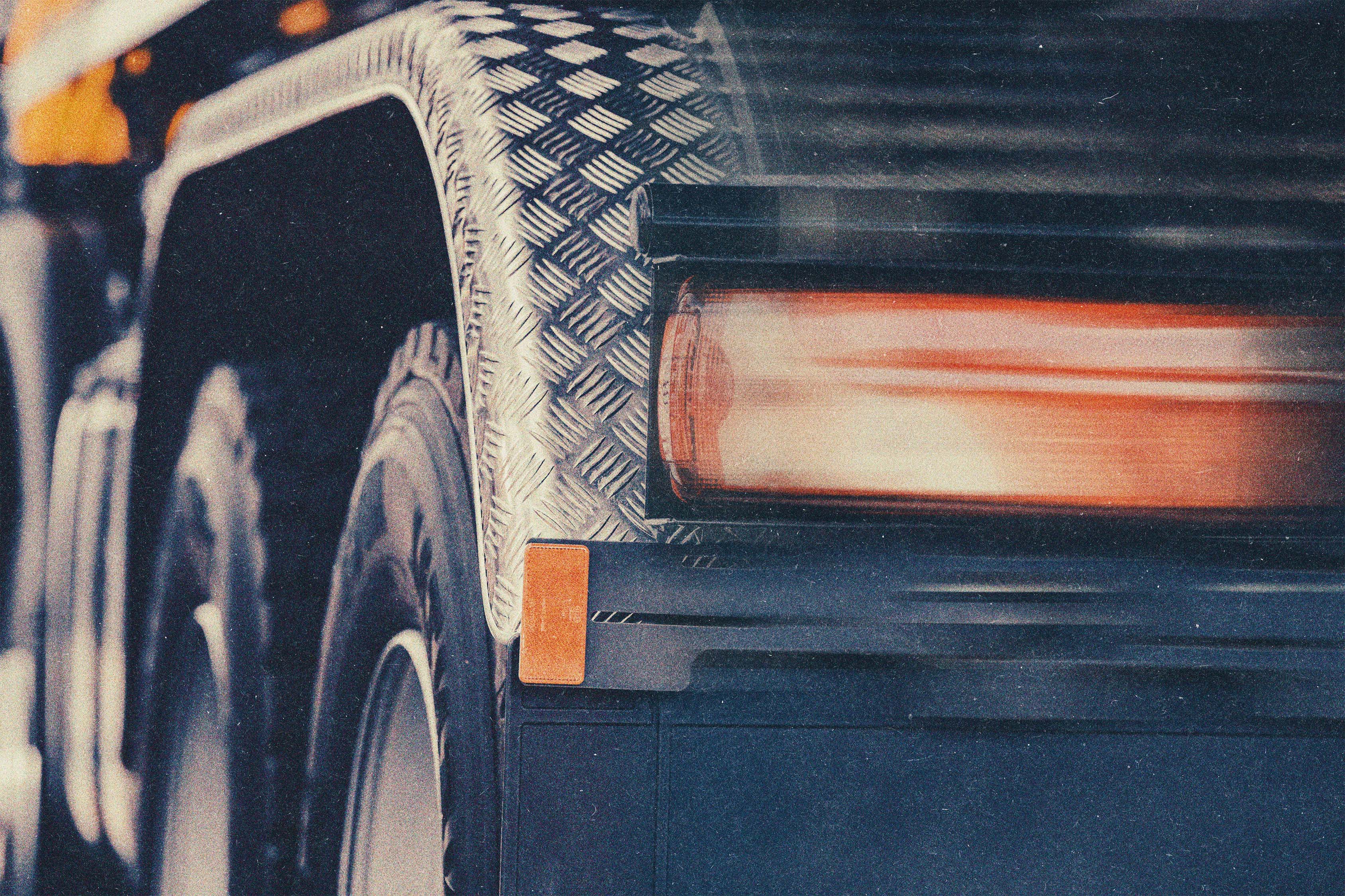 Close-up of a truck tail light on the road