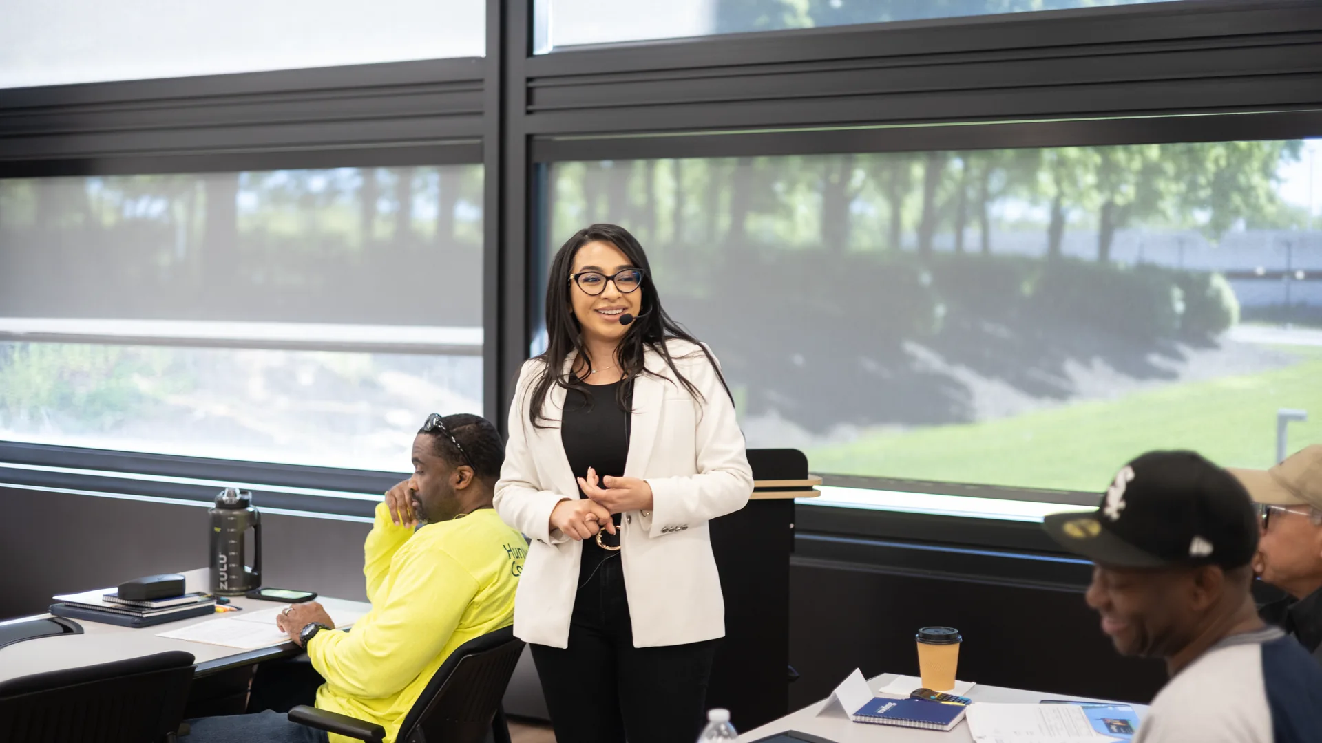 An instructor teaching a public adjuster exam prep class