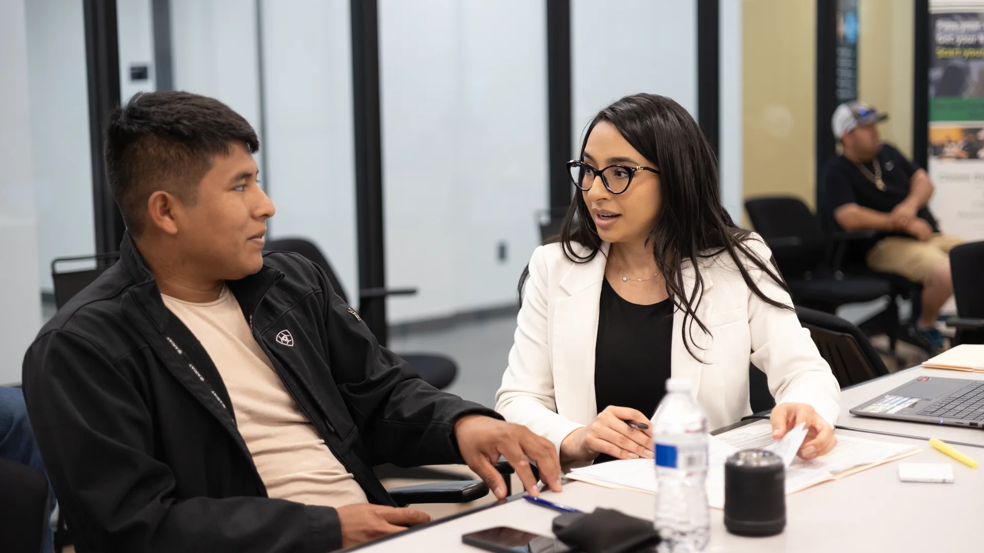 Dalia Doherty working one-on-one with a student