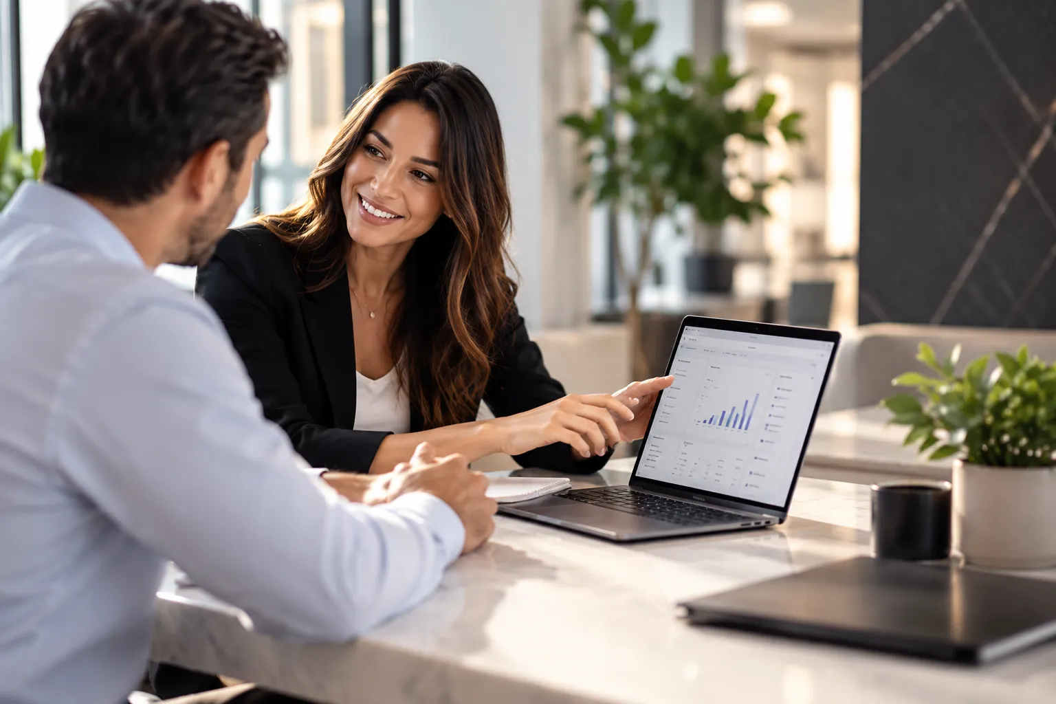 Business consultation reviewing payment processing and reporting