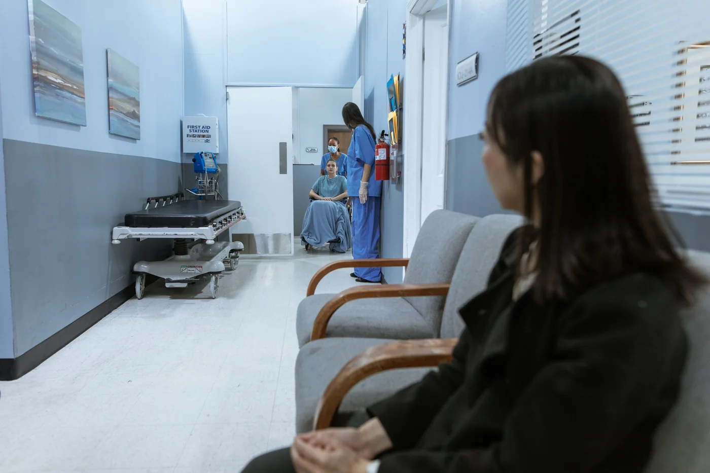 Pharmacist walking through a hospital corridor