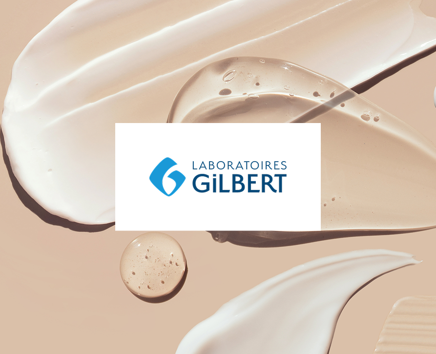 Logo Laboratoires Gilbert sur des textures de crèmes cosmétiques