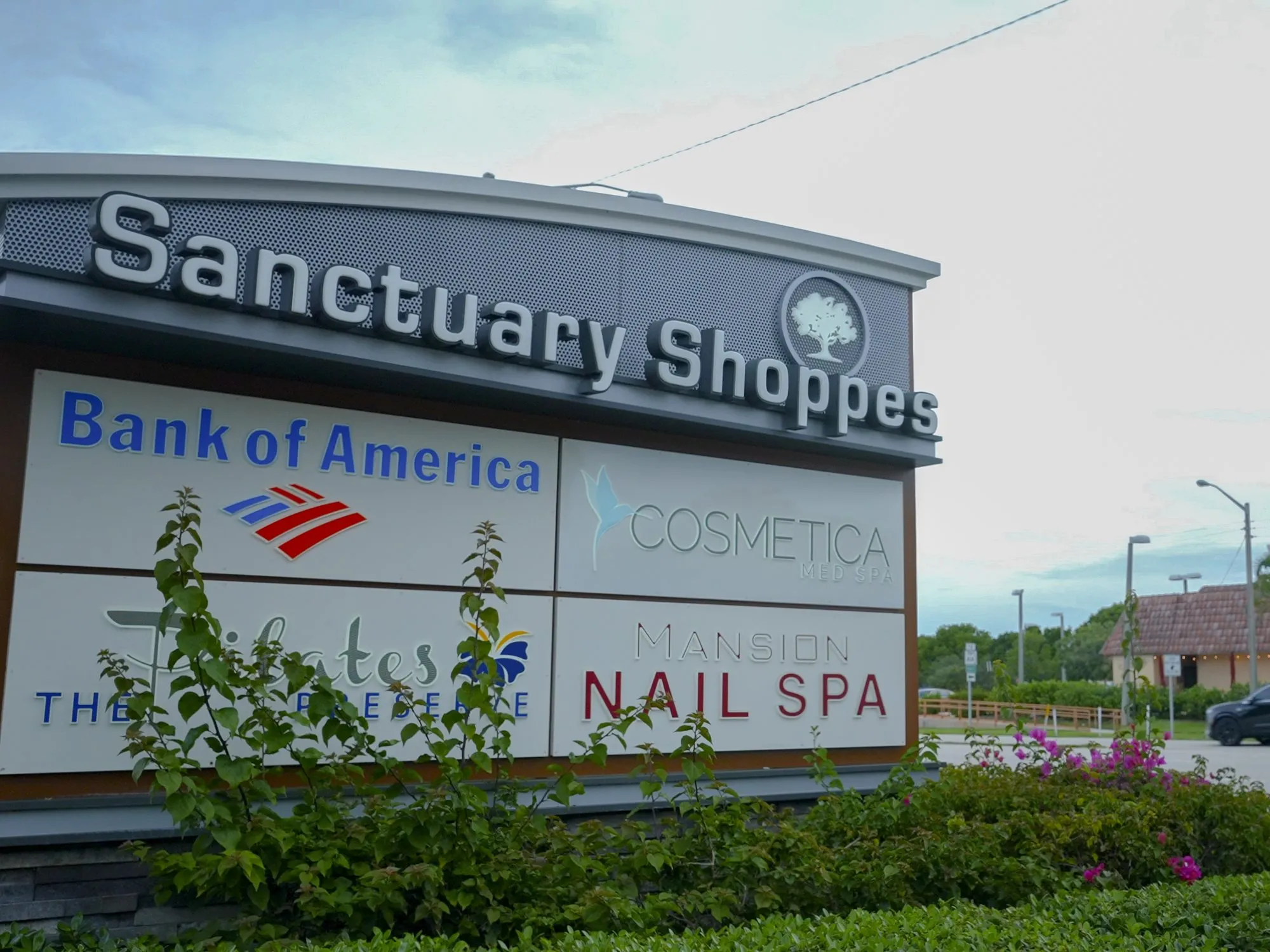 Sanctuary Shoppes plaza sign with Cosmetica Med Spa on N. Federal Highway, Boca Raton