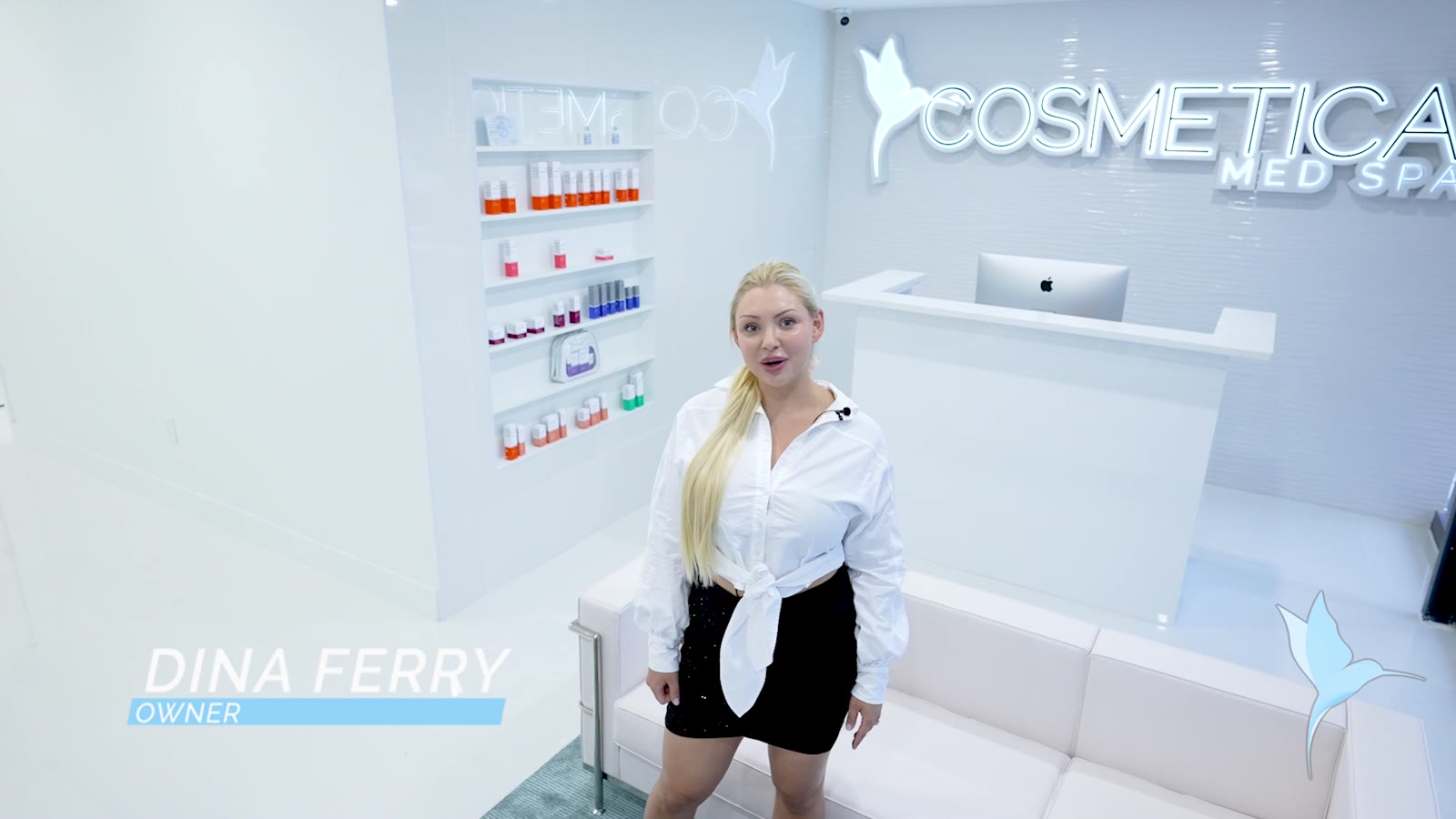 Dina Ferry, founder of Cosmetica Med Spa, at the reception desk