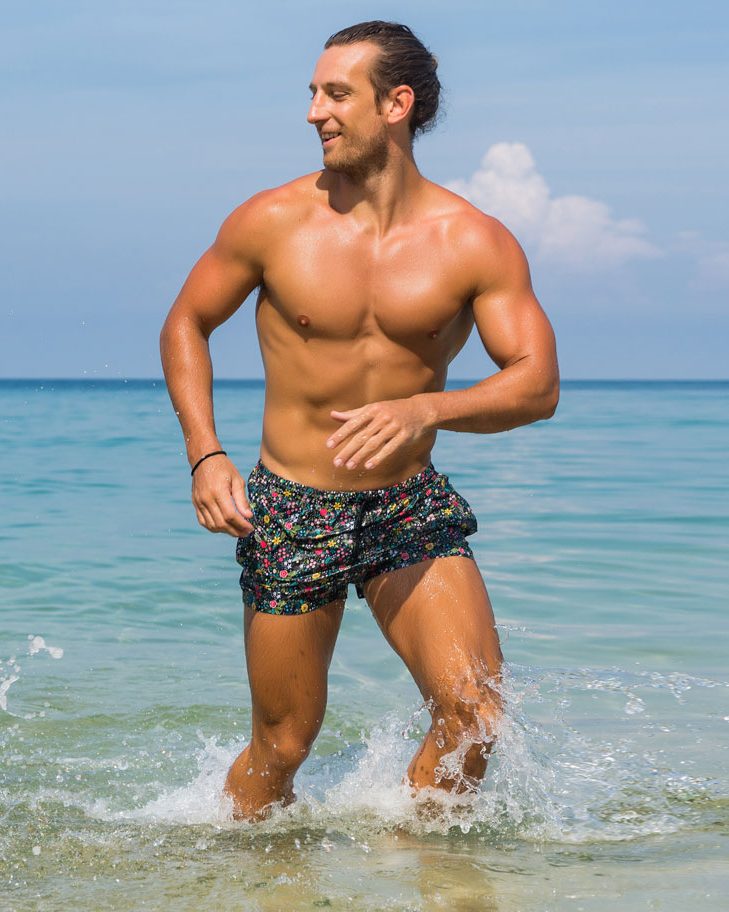 Healthy, active man at the beach, representing testosterone therapy for men at Cosmetica Med Spa