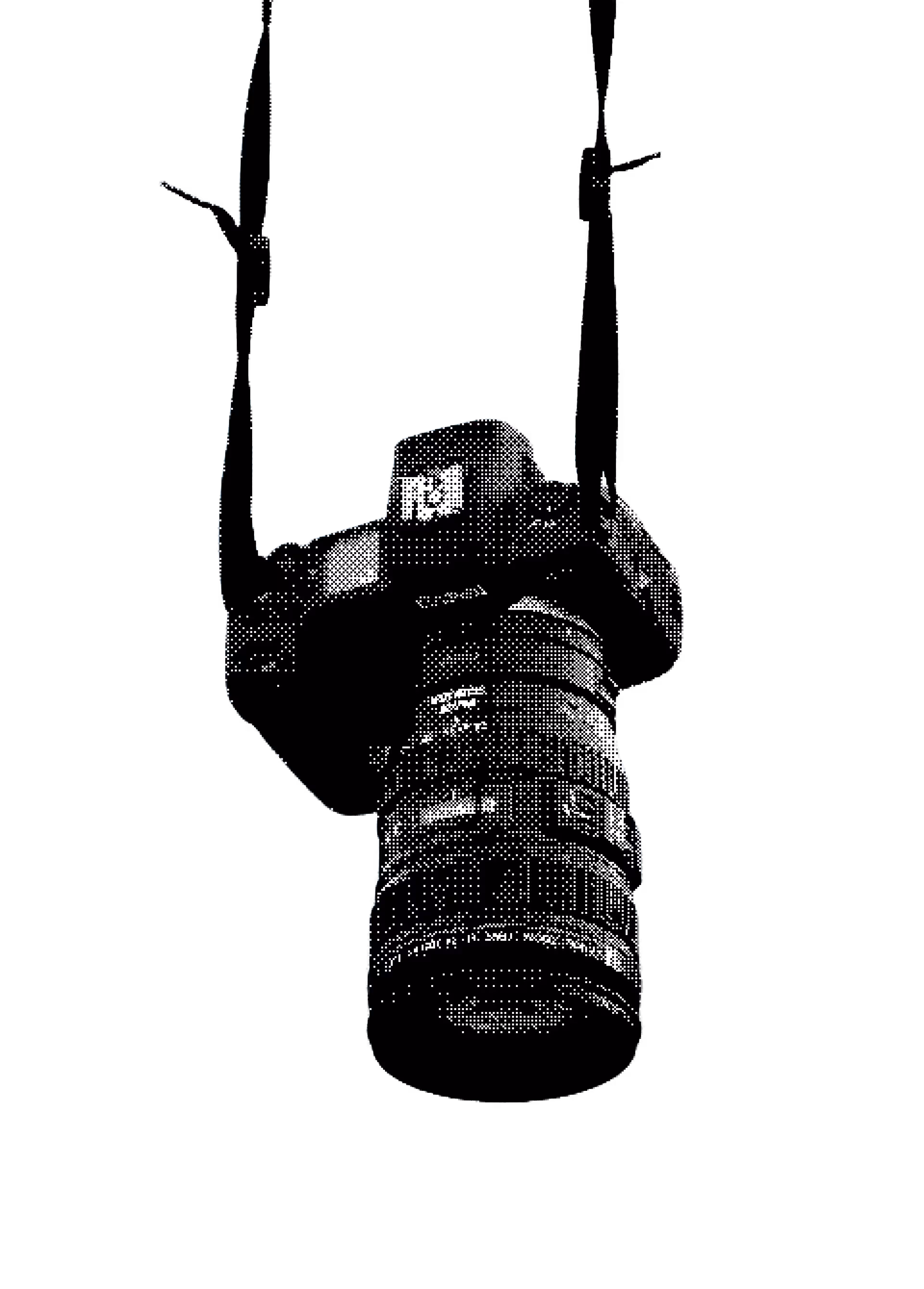 Black DSLR camera with a zoom lens hanging by a strap against a black background.