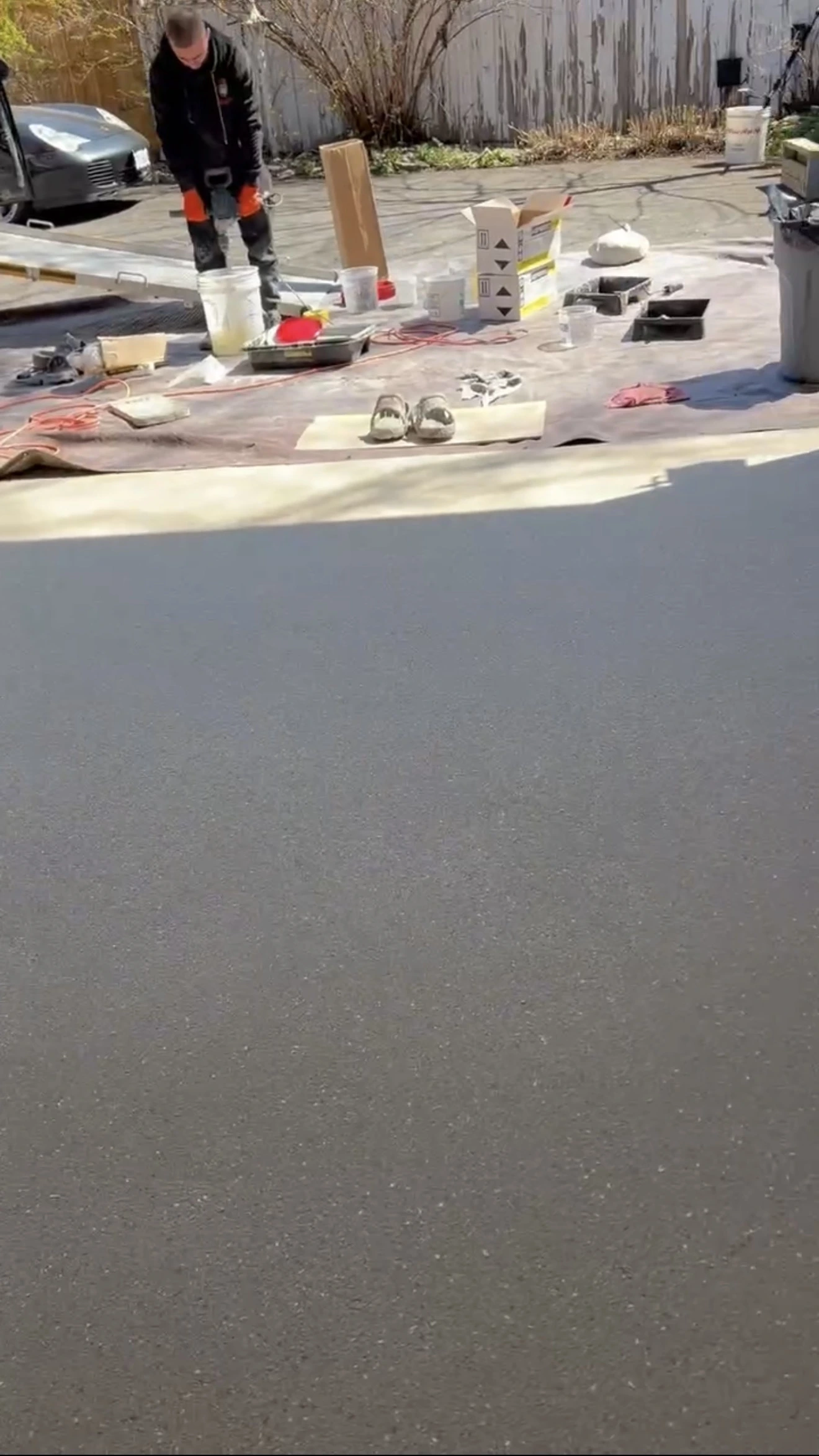 Diamond grinding bare concrete to prepare an Innisfil garage floor for coating