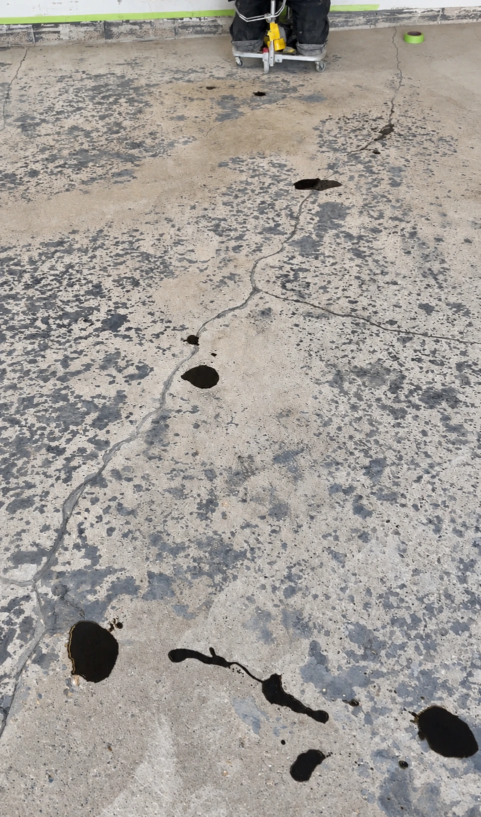Surface scaling and small pits in a salt-exposed Innisfil garage floor