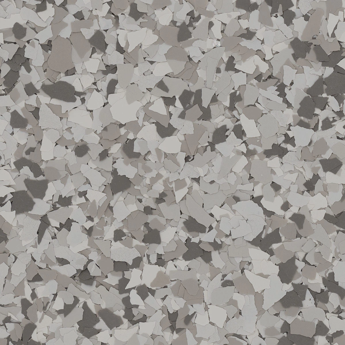 Dovetail (FB-823) is a decorative epoxy floor coating blend that combines warm brown, soft grey, and crisp white flakes to create a balanced, versatile appearance. Its neutral earth-tone palette provides subtle depth and character while complementing both 