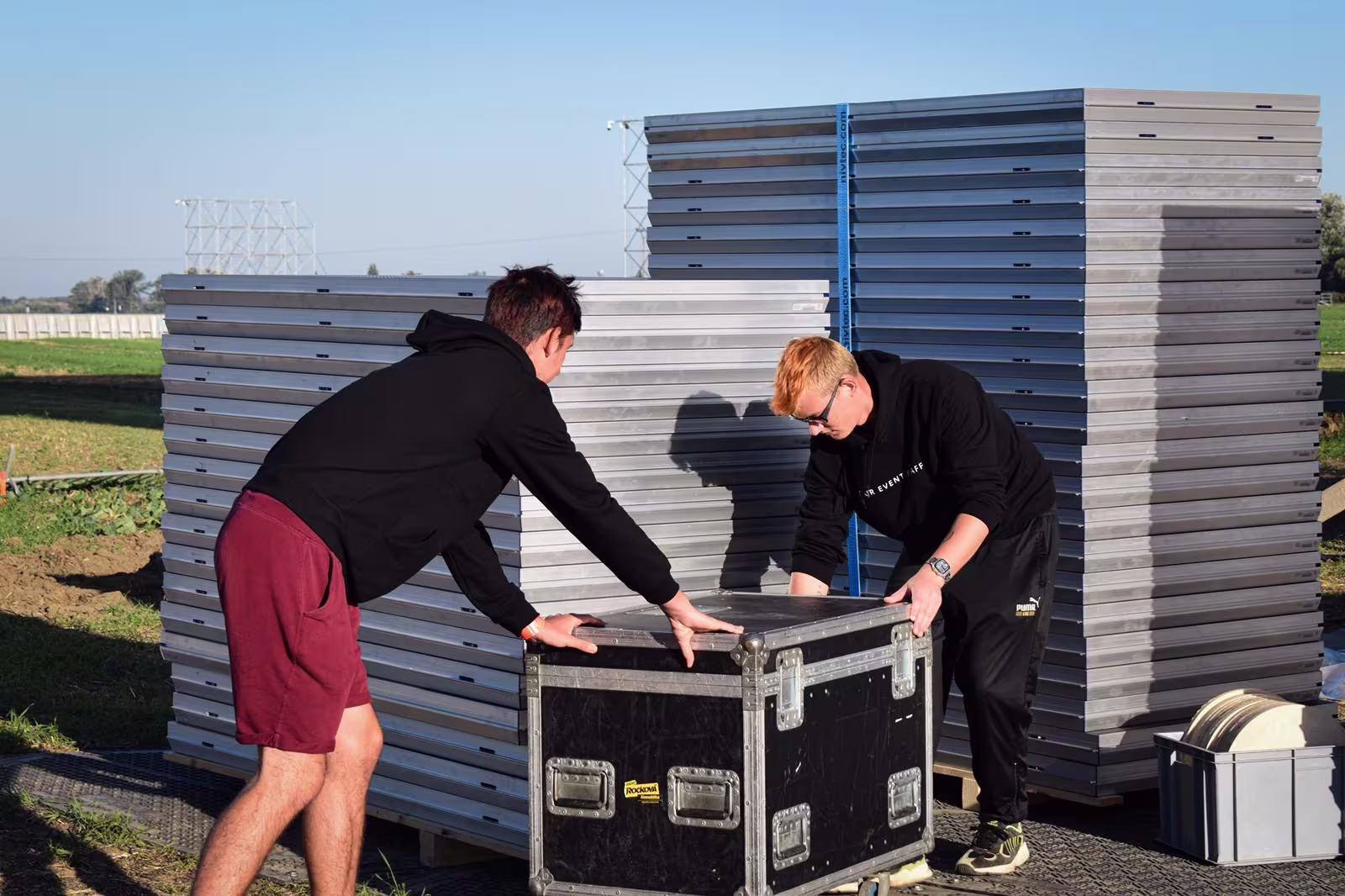Event crew preparing equipment for an AC/DC concert