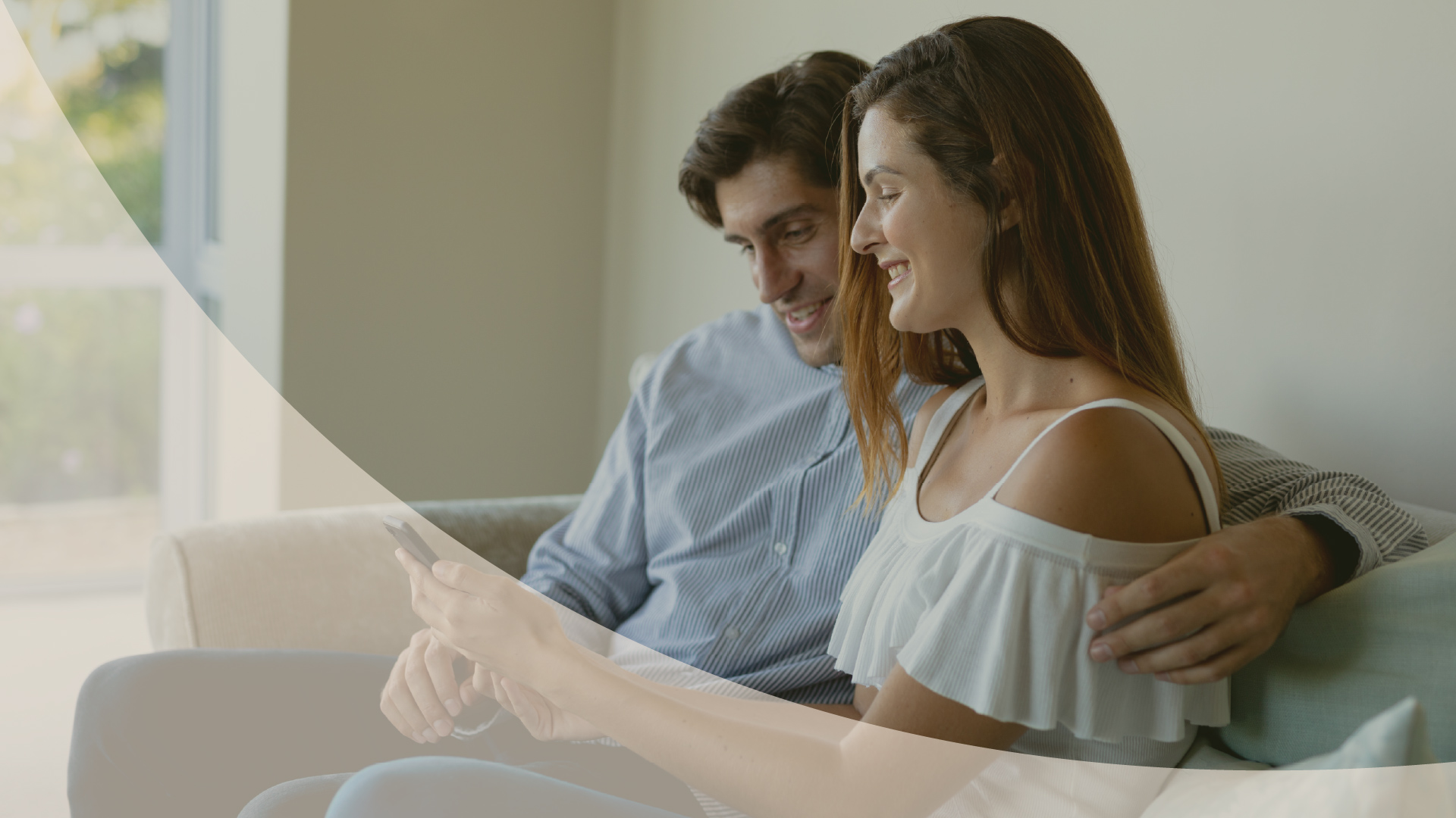 Couple reviewing a document together at home