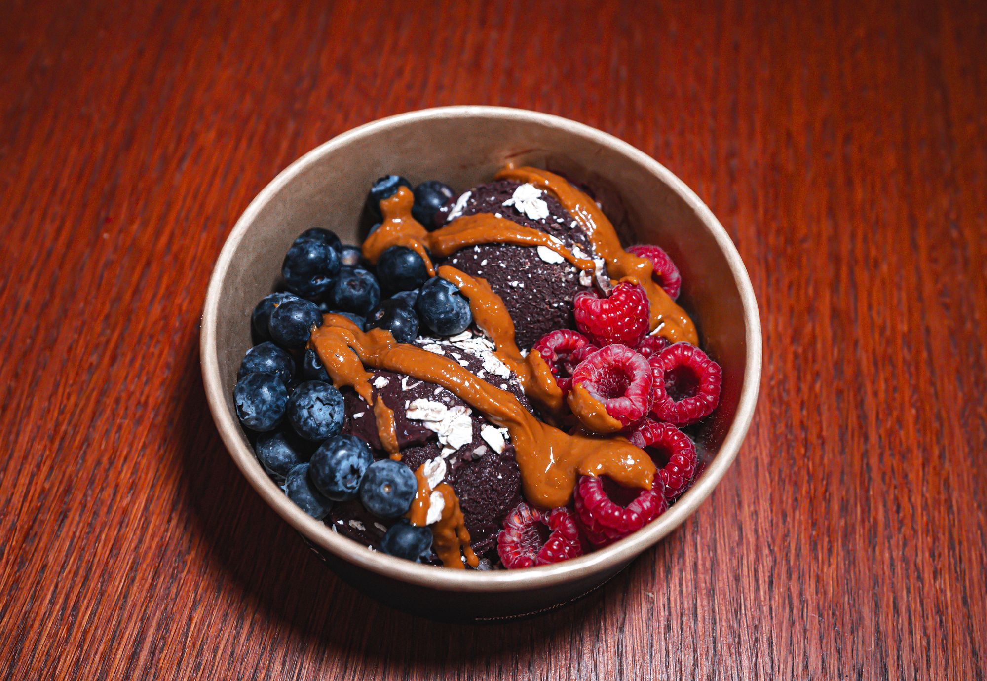 Phil's Bowl organic acai bowl with blueberries, raspberries, peanut butter and gluten free oats