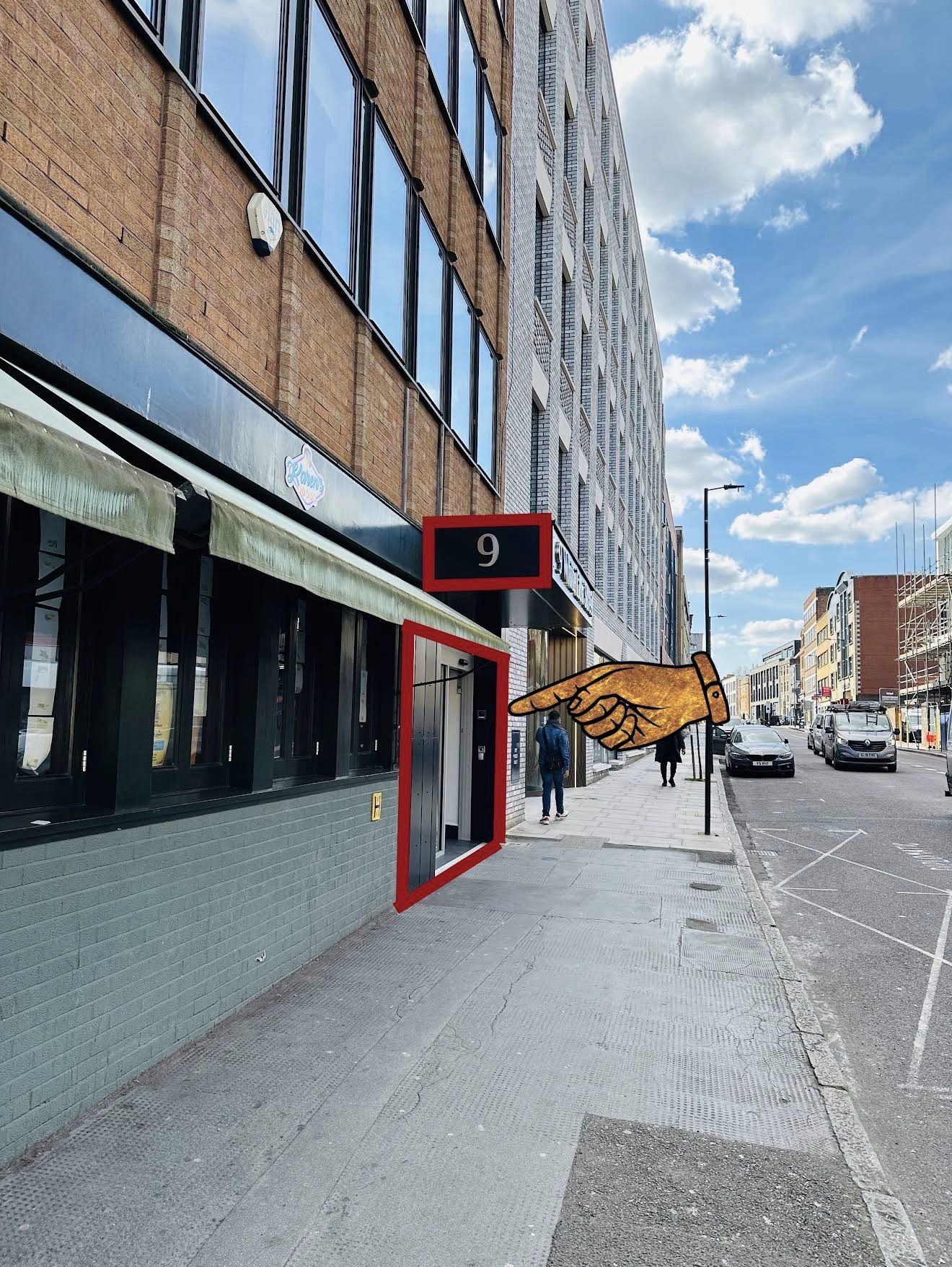 Street view of 9 White Lion Street, Angel, with the number 9 sign above the entrance to Ritual Cafe