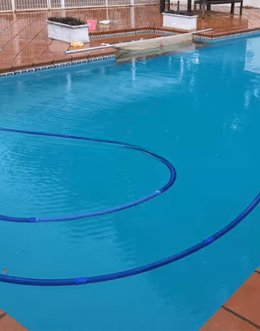 Clear blue swimming pool after professional cleaning