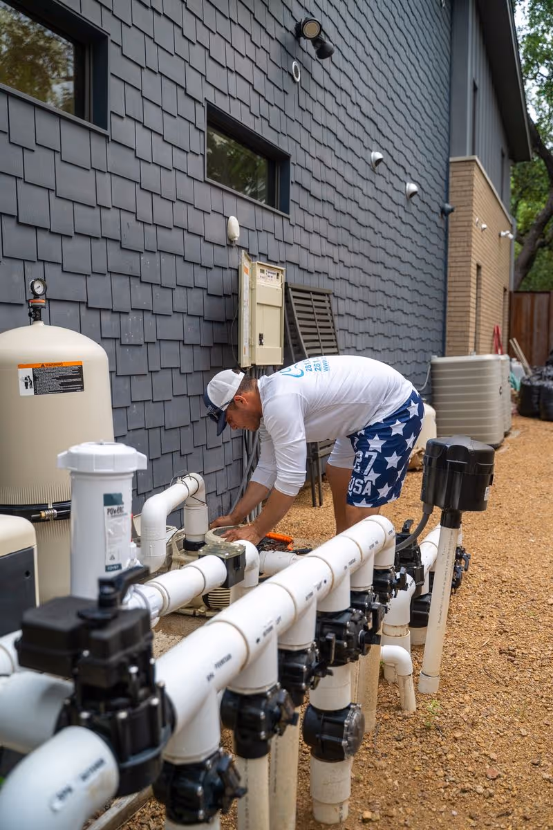 Year-round pool maintenance service keeping a backyard pool clean and balanced