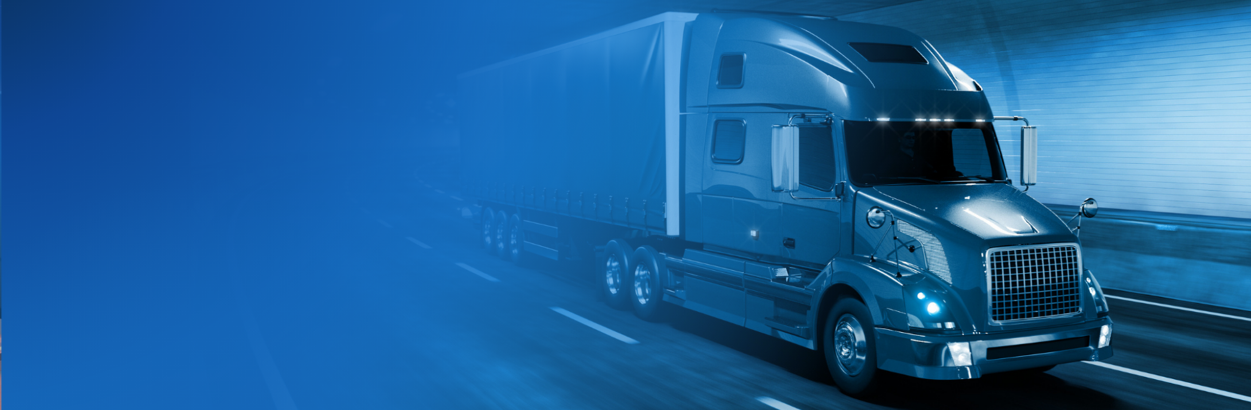 Blue semi truck driving through a tunnel with a blue gradient overlay