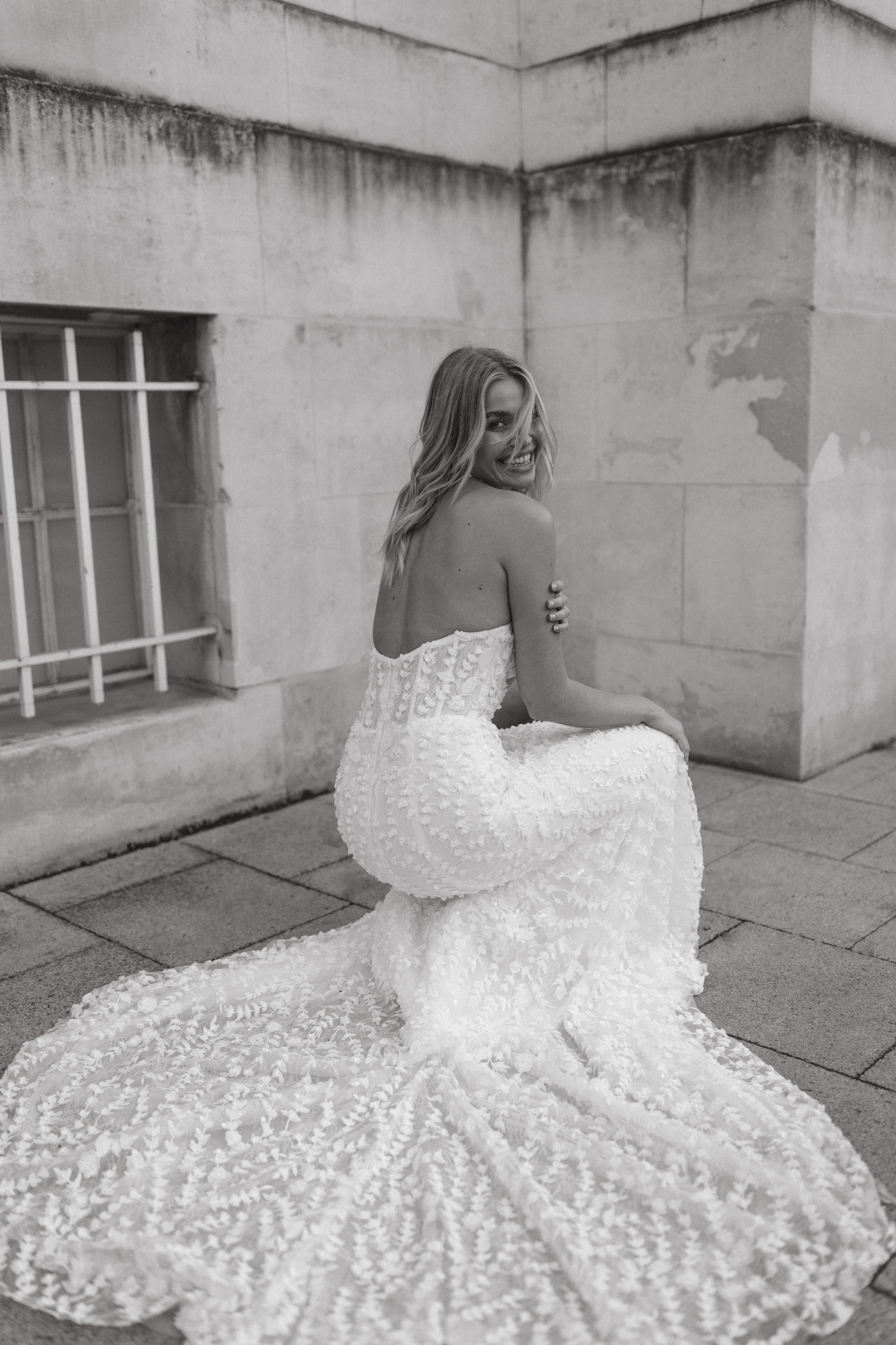 POSIE by MWL BRIDE — bride seated with train