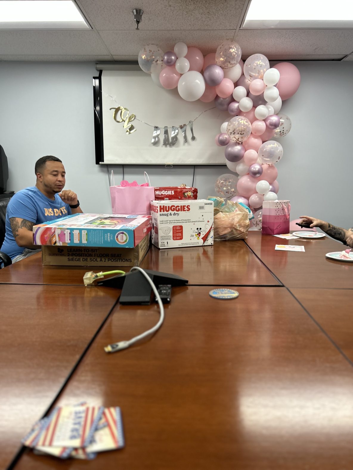 HG Logistics Showers Employee, Chris, with Baby Essentials