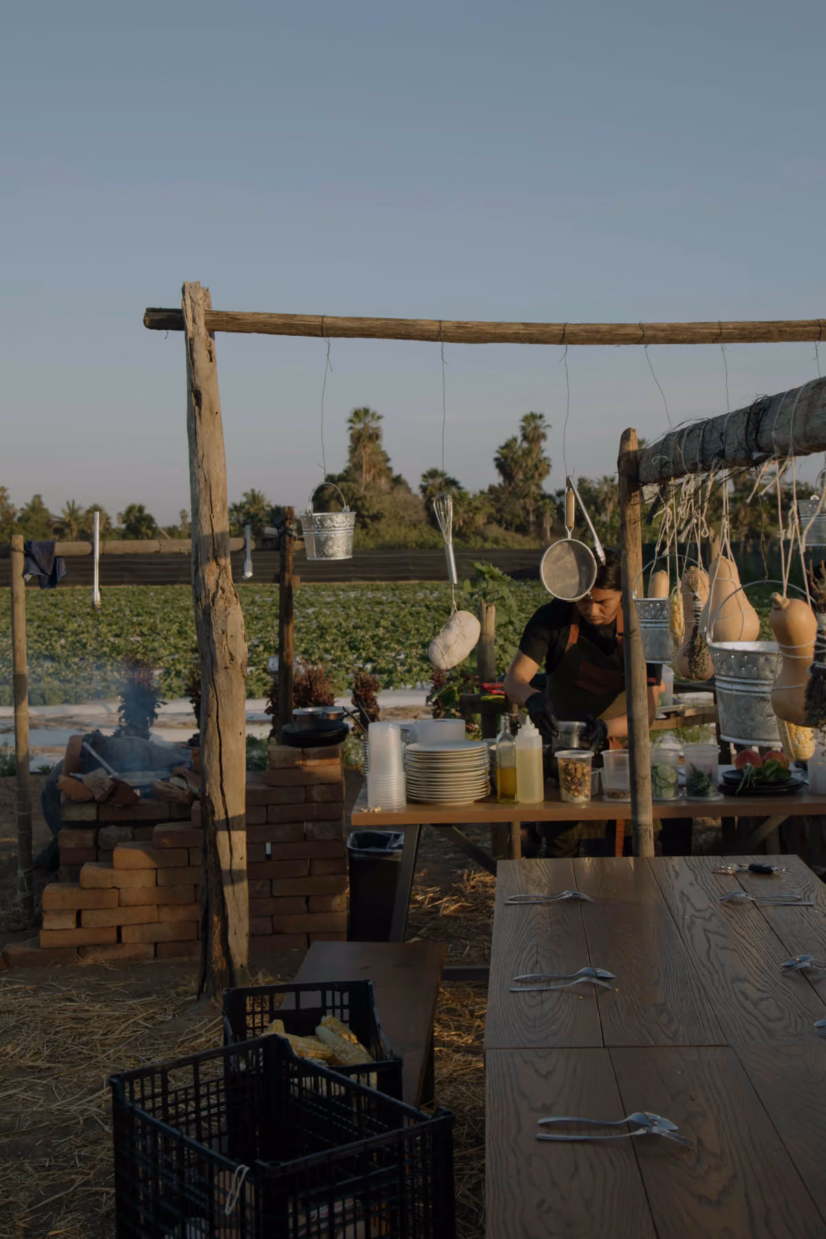 Outdoor farm kitchen workstation at golden hour