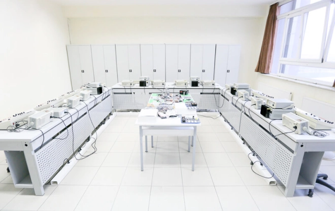 Electronics laboratory with rows of workstations