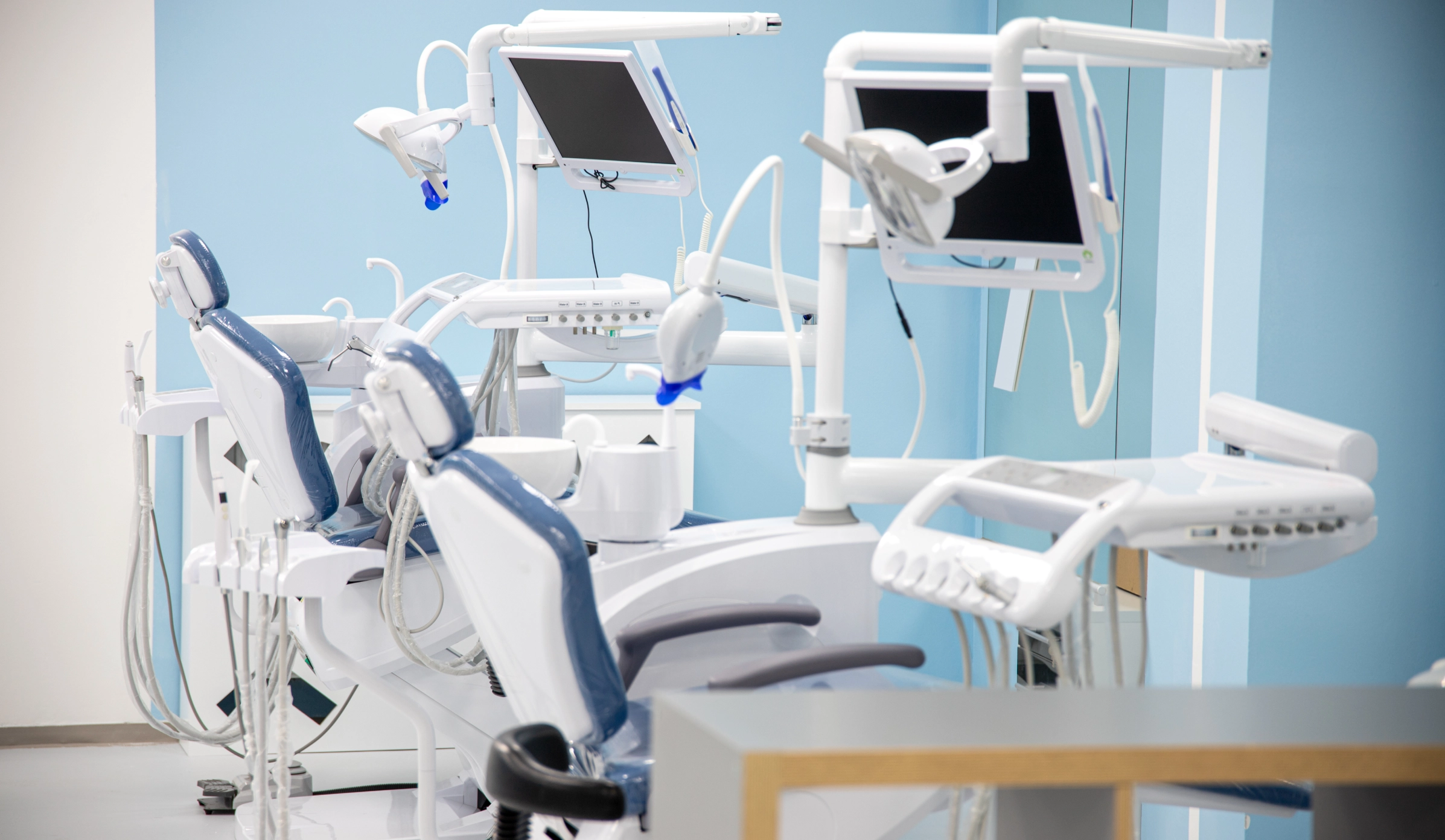 Row of dental treatment units in the IBU dental training clinic