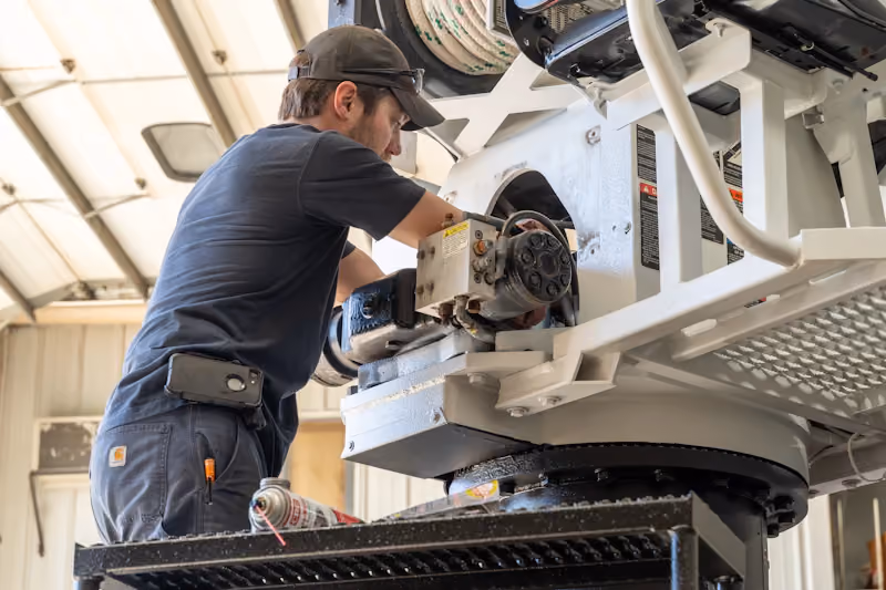 Mechanic providing crane repair in Rochester, NY