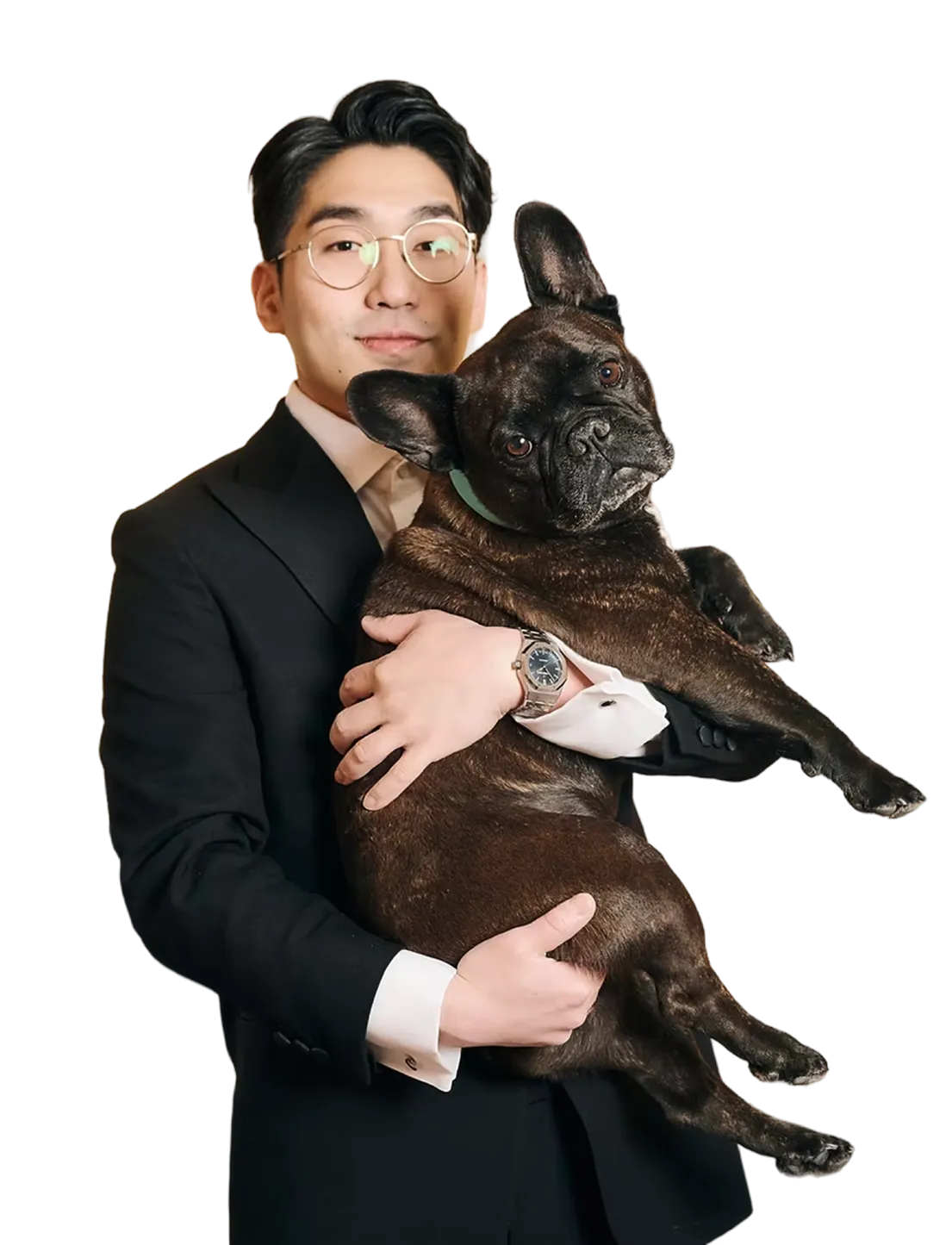 Dr. Brian Park, pediatric dentist at Thundercat Pediatric Dentistry, holding his French bulldog