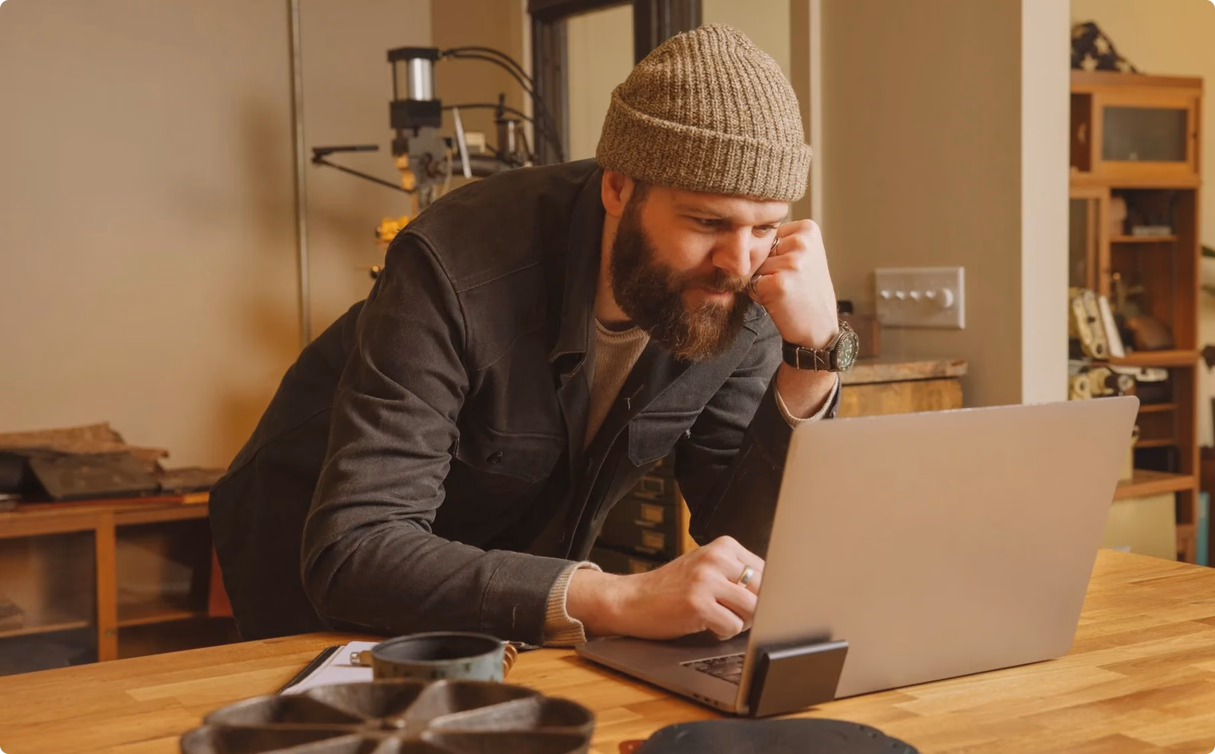 Man reviewing an insurance billing question on his laptop.