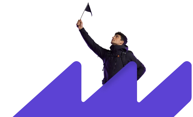 Alpinista no cume erguendo uma bandeira