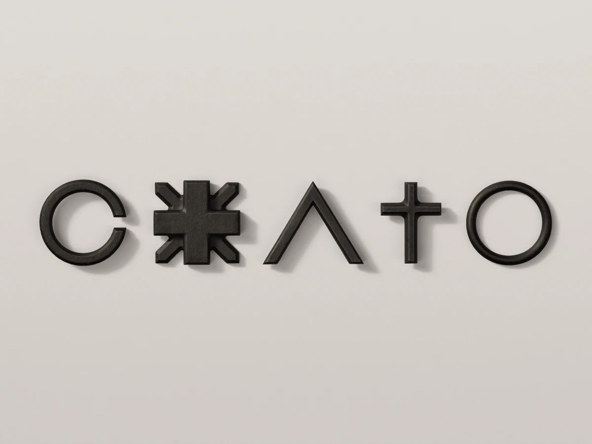 Black 3D logotype letters on a light grey wall