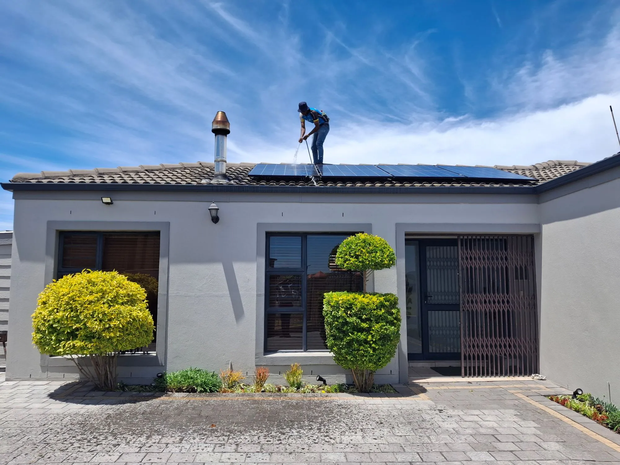 Technician working on solar panels