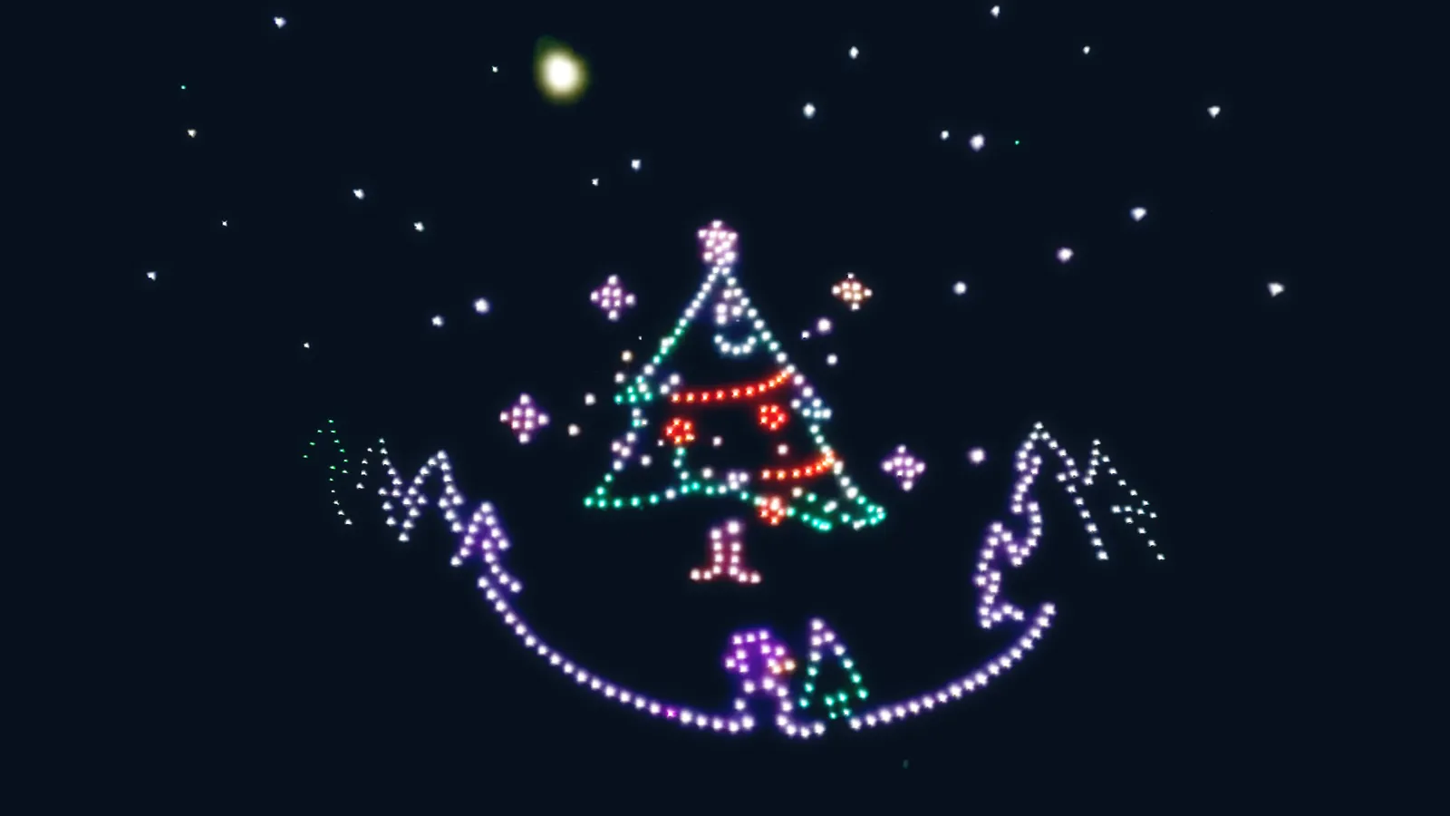 Un grand sapin de Noël lumineux dessiné par les drones dans la nuit