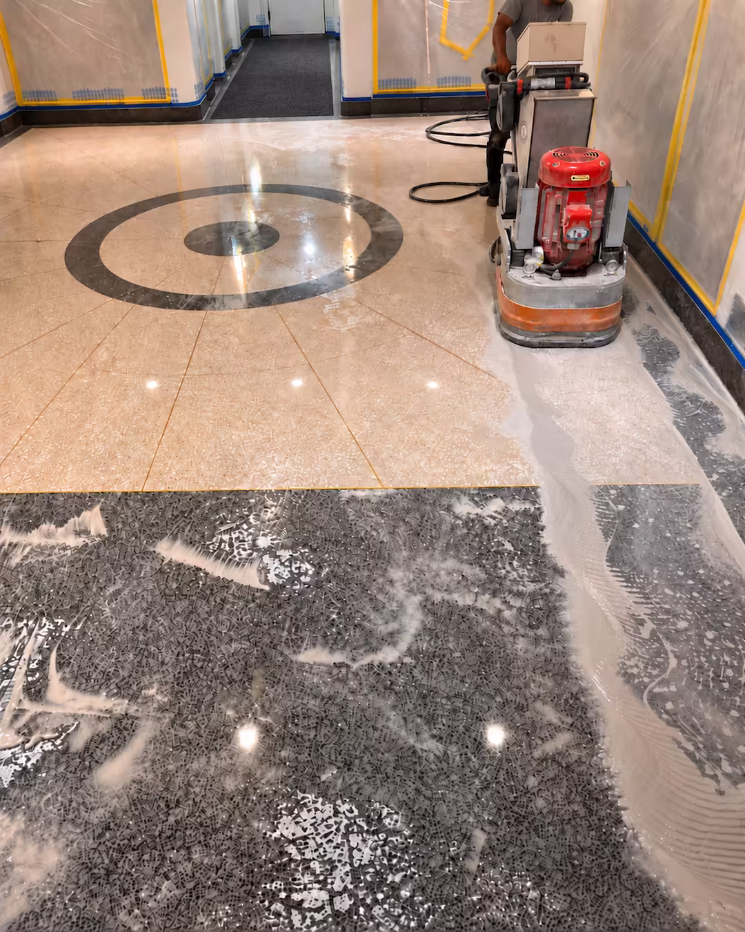 Completed Shore Towers lobby with epoxy terrazzo flooring and travertine walls