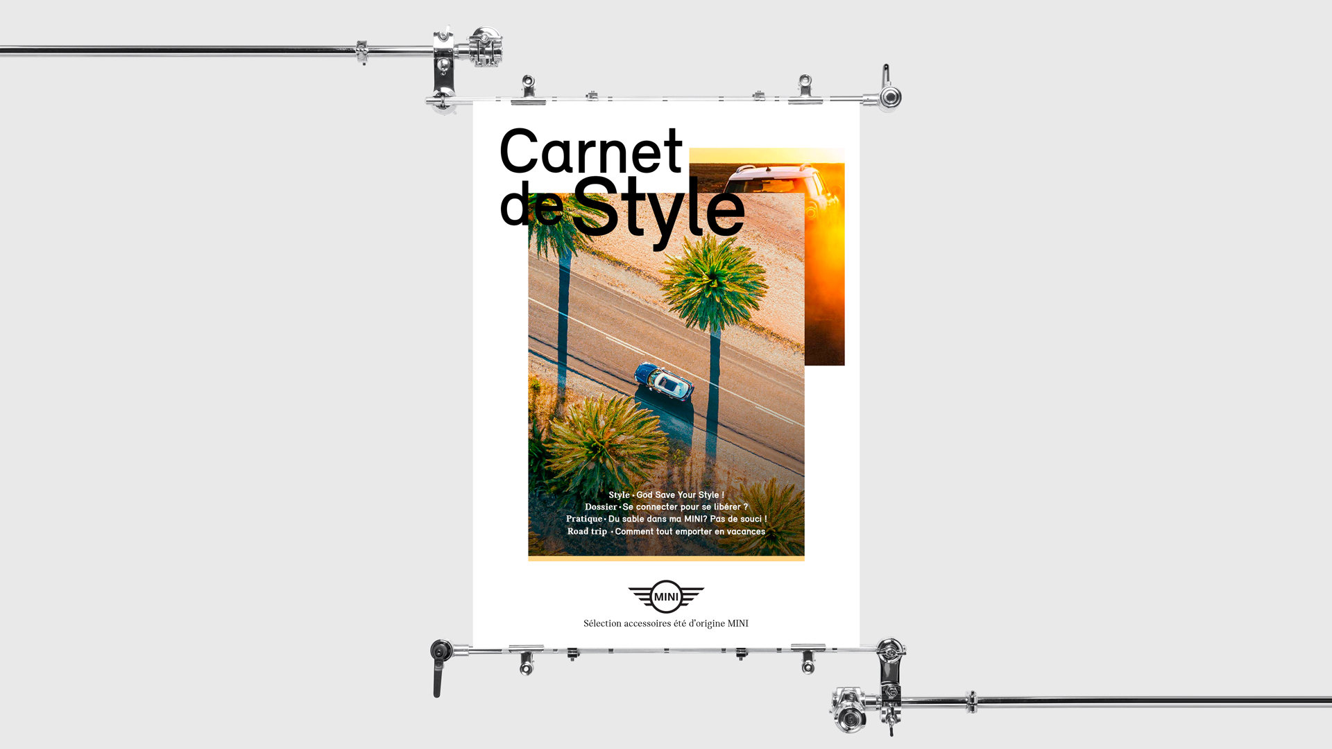 MINI, affiche « Carnet de style » : une MINI vue du ciel sur une route bordée de palmiers, et le sommaire, Style, Dossier, Pratique, Road trip