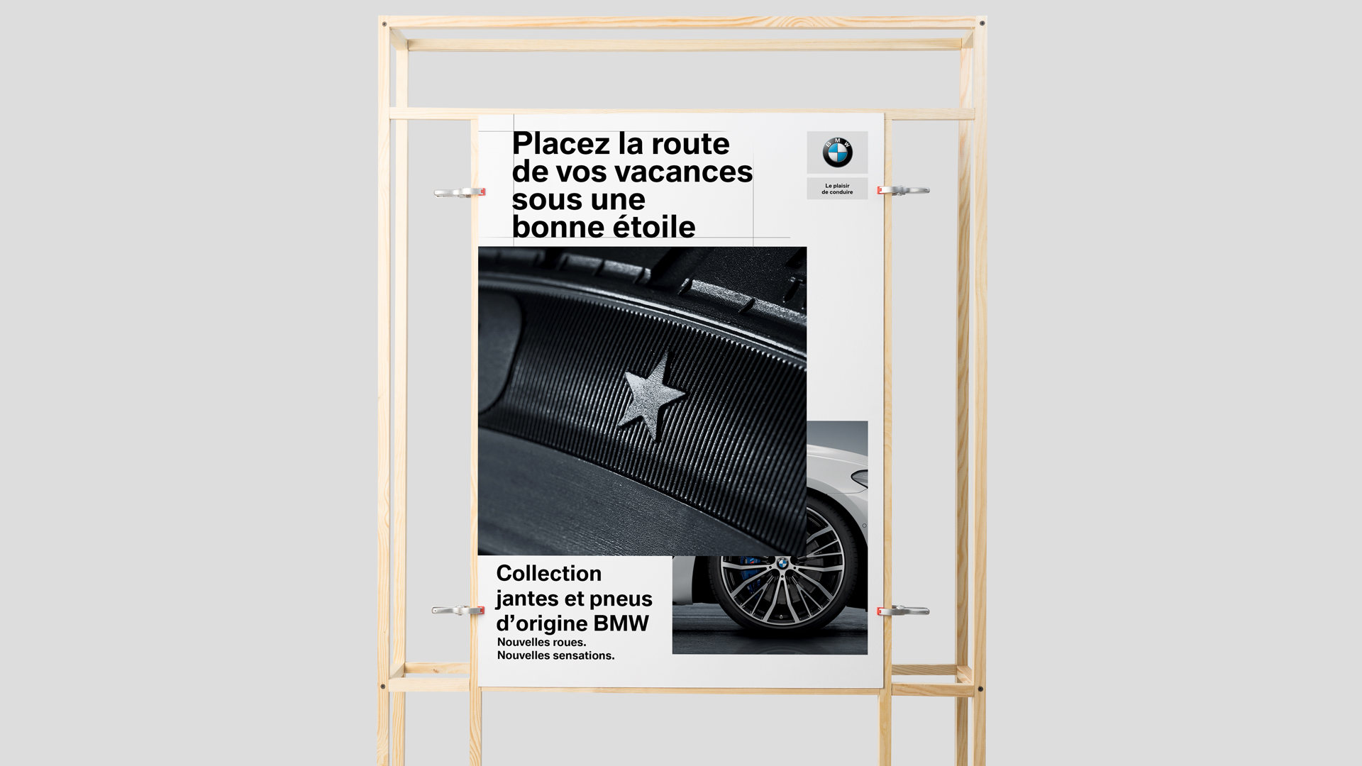 BMW, affiche « Placez la route de vos vacances sous une bonne étoile » : l’étoile moulée sur le flanc d’un pneu