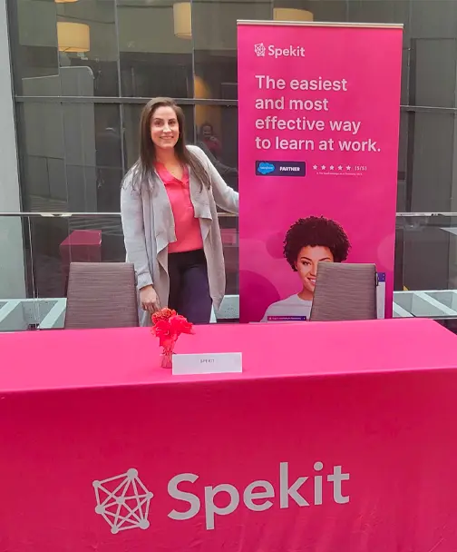 Person standing behind a Spekit table