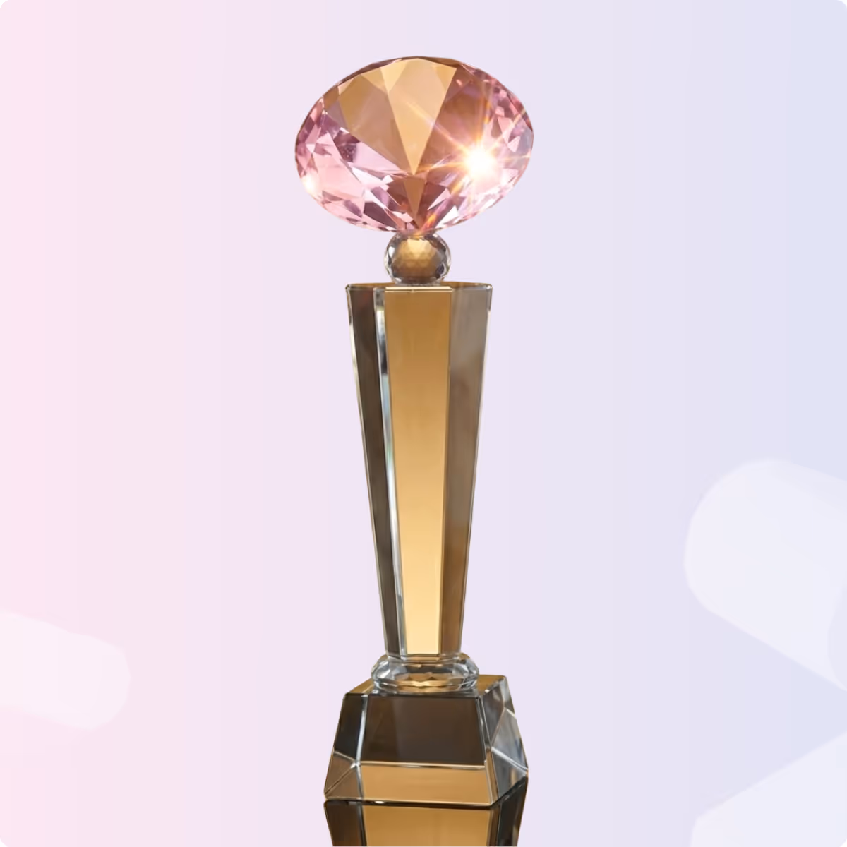 Tall trophy with a gold base and column topped by a large, faceted pink diamond-shaped crystal.