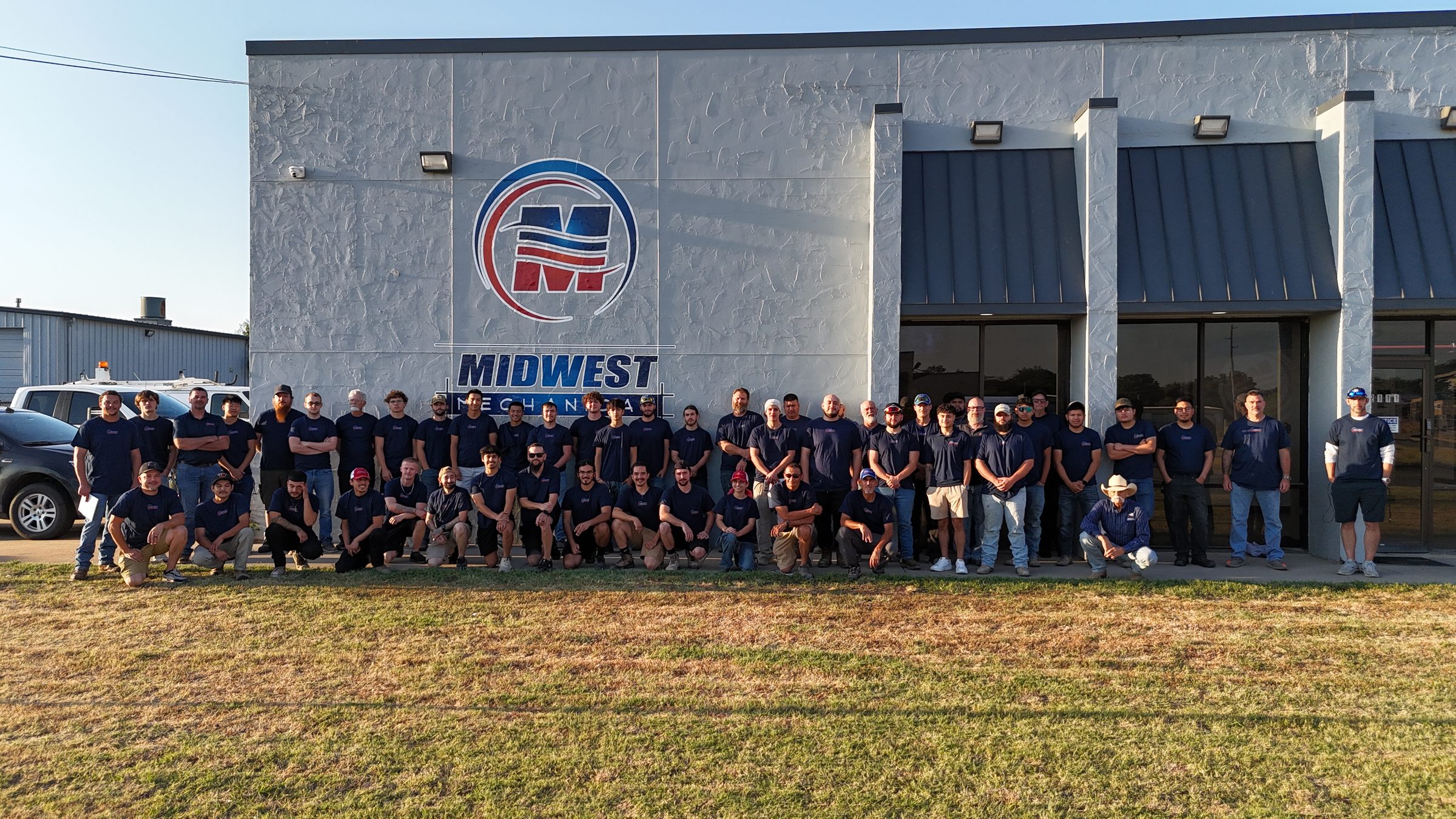 The Midwest Mechanical team in front of our shop in Wichita, KS