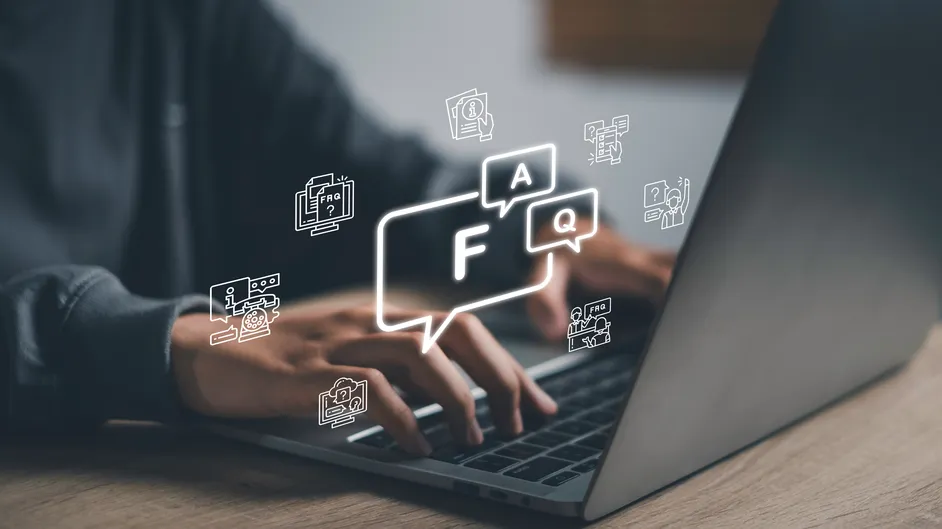 Hands on a laptop with FAQ chat icons floating above.