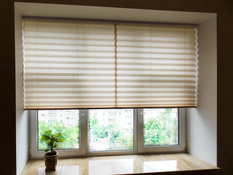 Pleated shade on a wide window